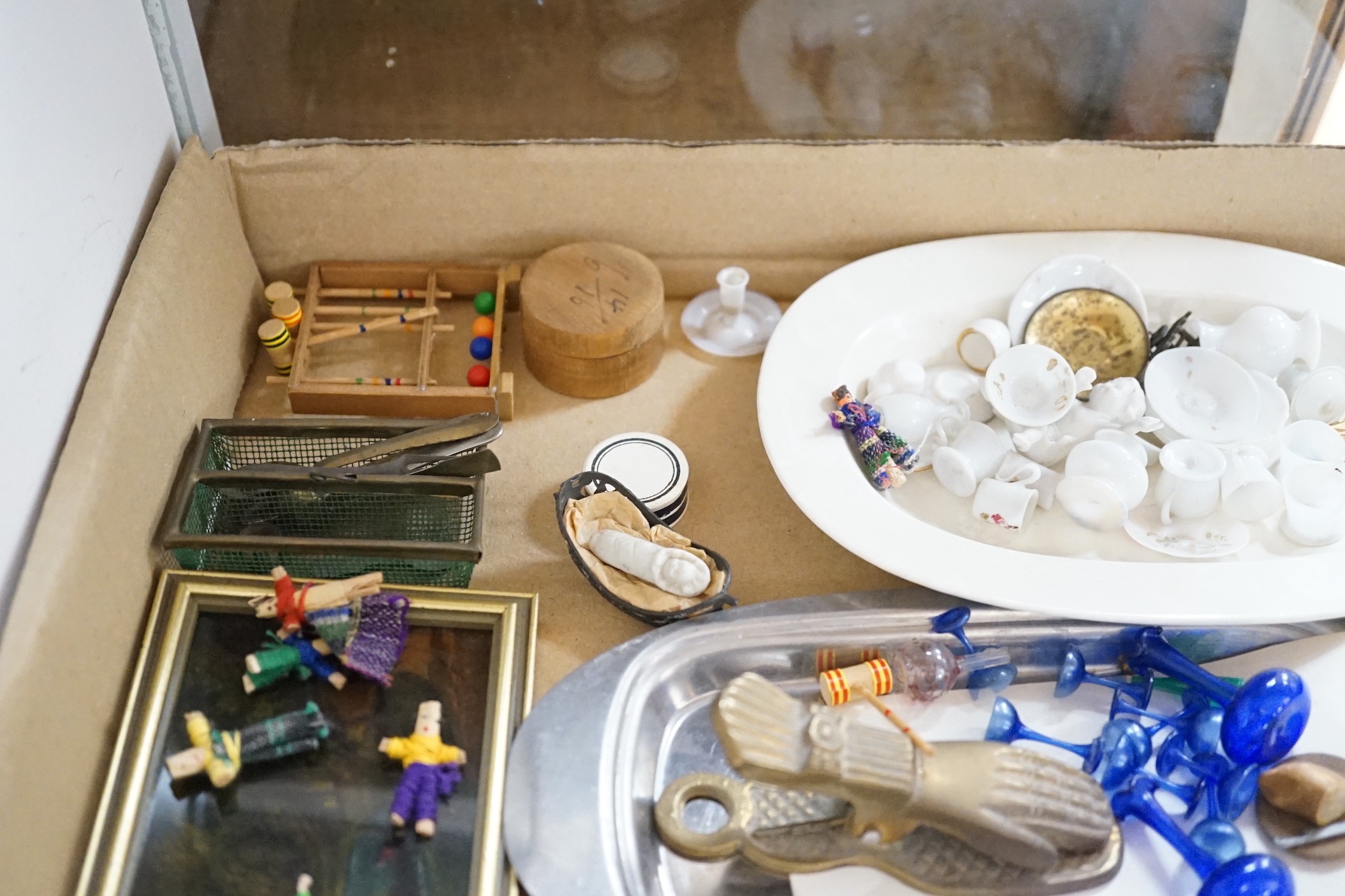 A collection of mixed odd dolls house ceramics including a miniature toy monkey, possibly Schuco